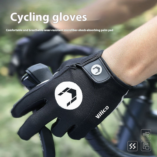 A close-up shot of an adult wearing black touchscreen sports anti-slip fitness gloves while gripping a bicycle handlebar. The gloves display a white logo and the brand name "Zendrop." Text on the image reads "Touchscreen Sports Anti Slip Fitness Gloves" and describes them as comfortable, breathable, and wear-resistant.