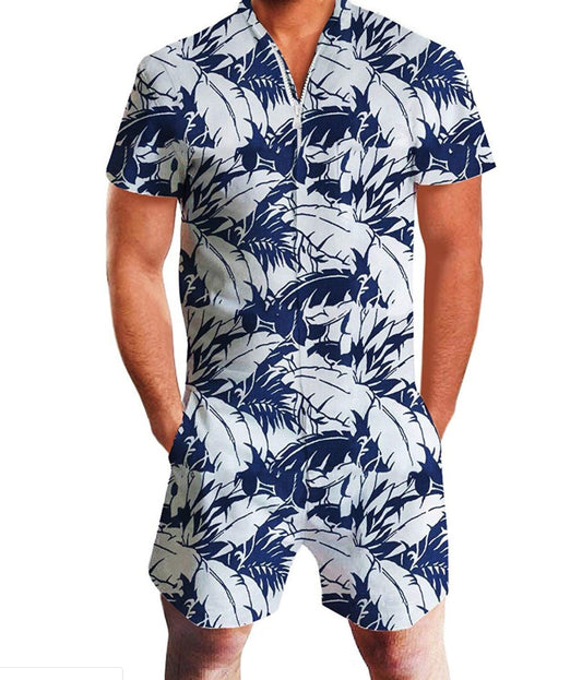 Someone dressed in the Summer Hawaiian Feather Print Short-Sleeve Jumpsuit effortlessly embodies summer style with its bold, dark blue and white feather pattern. The jumpsuit's front zip and pockets make it perfect for a casual look, ideal for keeping hands comfortably tucked in.