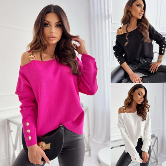 A woman effortlessly embodies urban style while seated on a white chair in a minimalist indoor setting, wearing the Fashion Chain Button Decoration Long Sleeved Top For Women in three chic variations: bright pink, black, and white. Each top showcases elegant asymmetric gold button details.