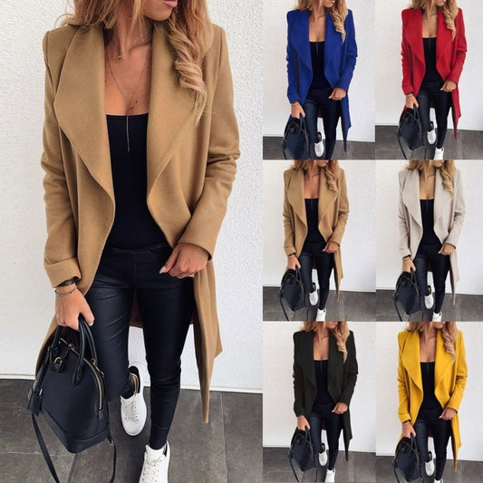 A woman wearing a CJ'S beige 'Coat Jacket Jackets For Women Puffer Outerwear Ladies' over a black top and black pants, holding a black handbag. This woolen coat is available in six different colors: blue, red, khaki, black, grey, and yellow. To ensure an ideal fit, refer to the size chart. White sneakers complete her look.