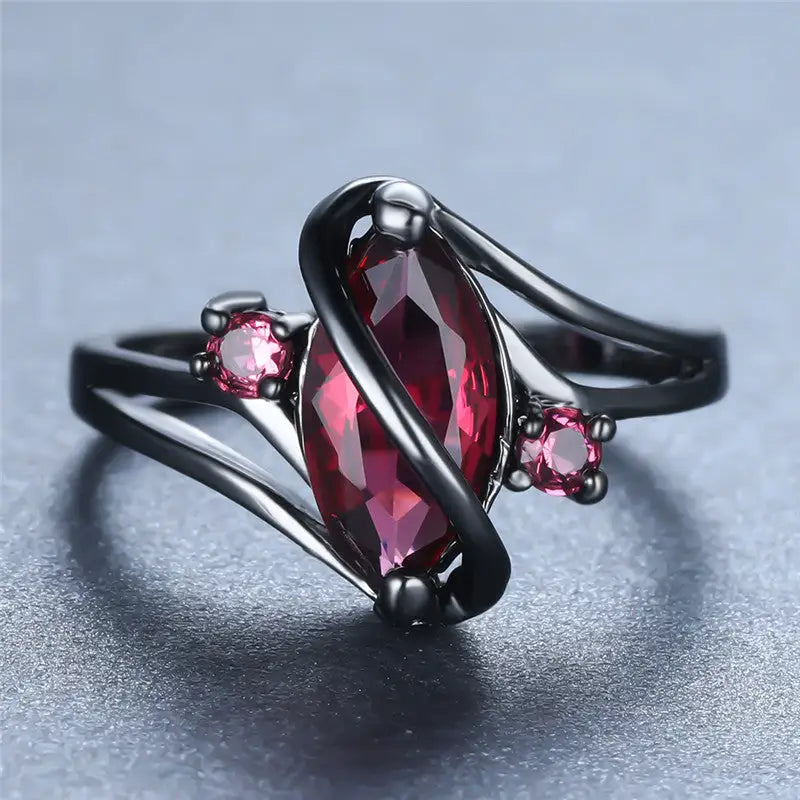 Red crystal ring with black band