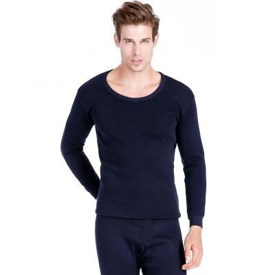 Wearing a Men's plus velvet thick round neck shirt in dark blue, paired with matching pants, a man stands against a plain white background to showcase his warm and breathable thermal underwear.