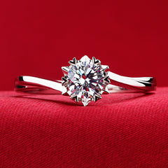 Classic Snowflake Ring crafted from high-quality materials, displayed beautifully on a red fabric