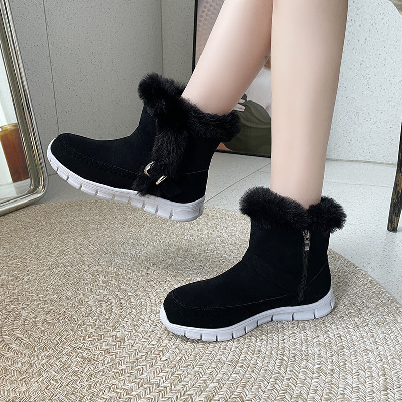 Women's plush ankle winter boots in black, featuring a stylish buckle design and faux fur lining, side view.