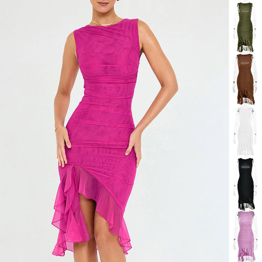 A person is wearing the Summer Sleeveless Dress For Women - Party Club Ready, featuring a fitted pink design with a unique ruched style and an asymmetrical ruffled hem. This comfortable dress is also available in colors such as green, brown, white, black, and red.