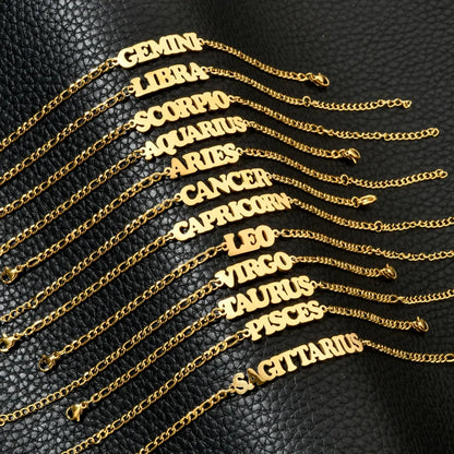 Zodiac charm bracelets on black background