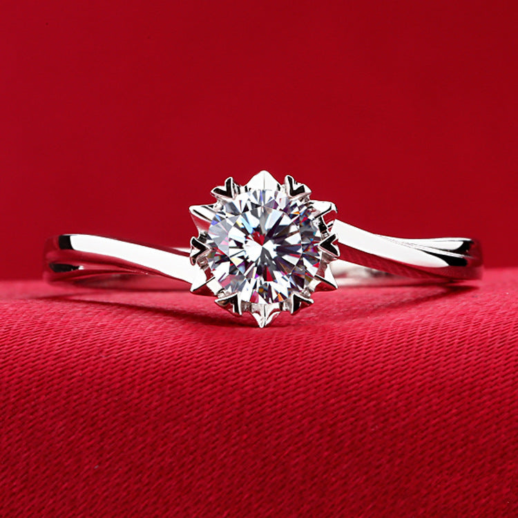 Elegant Classic Snowflake Ring on a red background