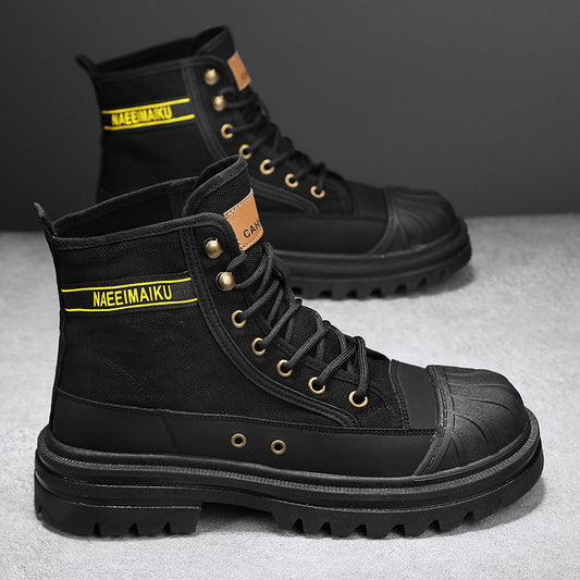 A pair of Zendrop Thick-soled Canvas Casual Sports Men's All-match Work Motorcycle Boots, featuring rugged soles and meticulous leather stitching. The black high-top sneakers are adorned with gold eyelets, black laces, and display yellow and black labels with the text "NAEEMAIKU" on the side and "CAMAL" on the tongue. They are showcased against a plain gray background.