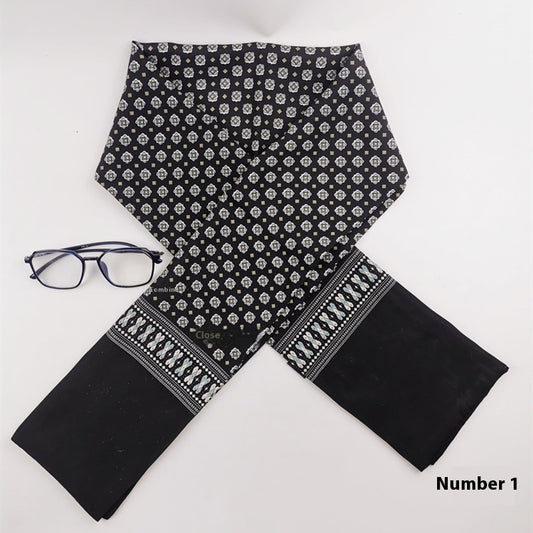 A Men's Simplicity Silk Scarf by Zendrop, featuring high-end washed cashmere for warmth, is neatly folded on a white surface. The black scarf with white geometric patterns has a decorative border at the bottom. Beside the scarf, there's a pair of black-rimmed glasses. The lower right of the image has the text "Number 1.