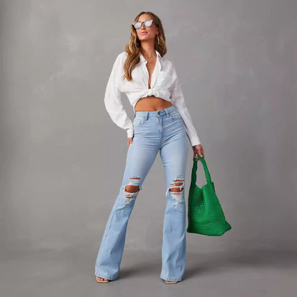 Light blue wide-leg jeans with distressed details