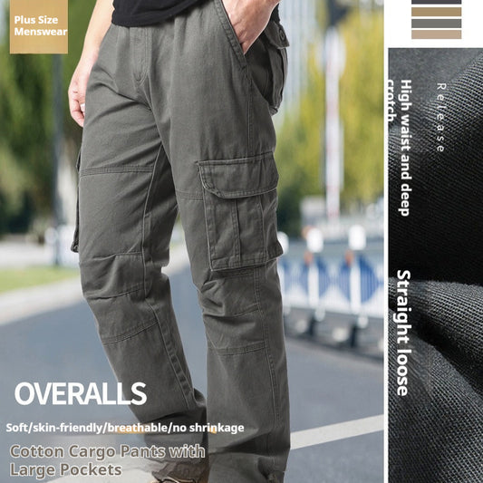 A person dressed in Men's Plus-Size Cotton Cargo Pants - Comfortable and Functional stands amidst an outdoor setting in olive green. The pants, featuring large pockets, provide a blend of style and practicality against a slightly blurred backdrop of greenery and a pathway. Made from soft, breathable cotton, these cargo pants are designed to prevent shrinking.