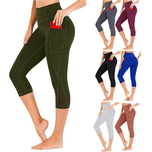 A person is wearing Zendrop's Cropped Pants Yoga Clothes Leggings in olive green, designed with a handy phone pocket on the side. To the right, there are six color options available: grey, dark pink, black, blue, white, and light brown. These printed fitness capri leggings feature high waistbands made from chemical fiber blending and are displayed from the side to highlight their quick-drying properties.