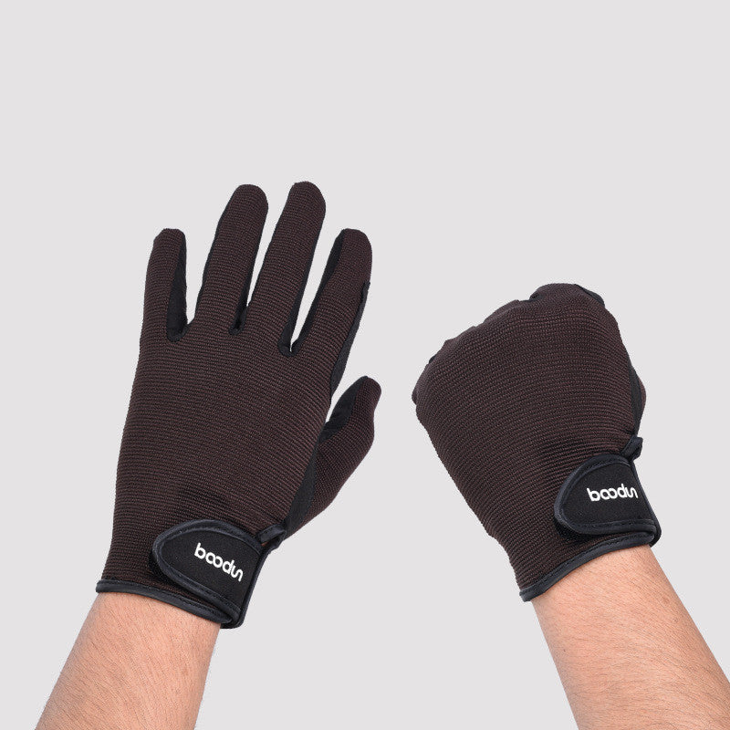 A pair of hands is shown wearing black Outdoor Touch Screen Full Finger Equestrian Gloves with adjustable straps at the wrist. The left hand is open, showcasing the glove's full design, while the right hand is clenched into a fist. Made from durable microfiber, these neutral-tone gloves feature the brand name "Zendrop" on the wrist straps.