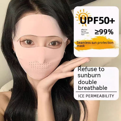 A person is seen wearing the Facekini Full Face Sunscreen Mask in a peach color, designed for sun protection with eye, nose, and mouth openings. Made from Ice Silk, this mask boasts UPF50+ rating, providing over 99% effective UV ray blocking. It features a seamless design and exceptional ice permeability for enhanced comfort.